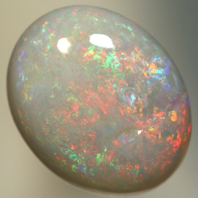 SOLID SEMI BLACK OPAL Pretty sparkles over a high dome